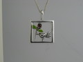 bird in garden pendant
