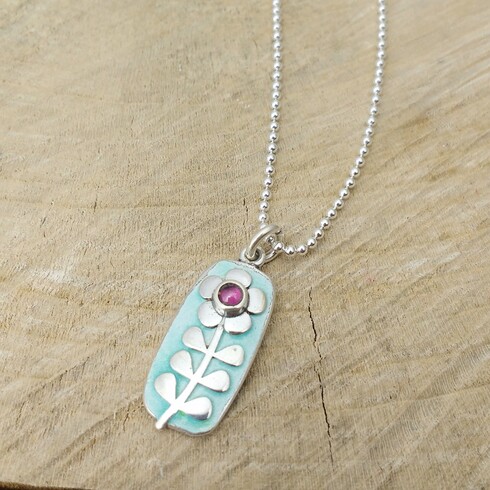 Aqua stem garnet flower pendant