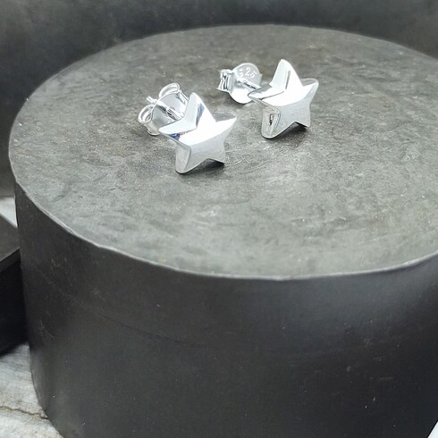 Small silver star earrings