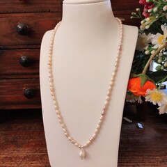 Tiny blush and white seed pearl necklace with pearl drop