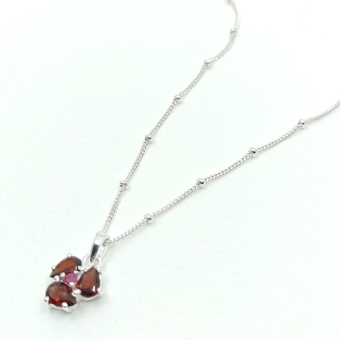 Garnet and ruby clover pendant