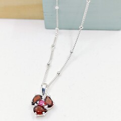 Garnet and ruby clover pendant
