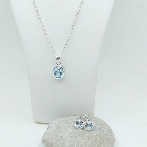 Oval Sky blue topaz bezel pendant
