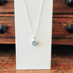 Round sky blue topaz pebble pendant