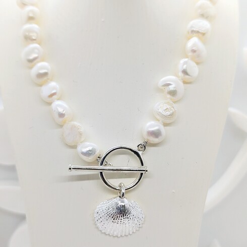 Hand knotted white keshi pearl clamshell necklace