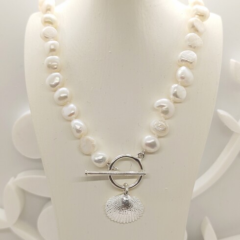 Hand knotted white keshi pearl clamshell necklace