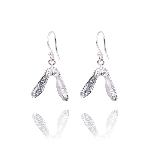 Silver sycamore drop earrings.