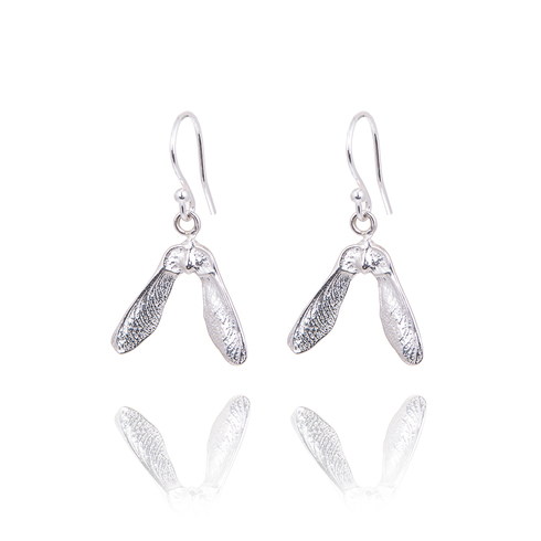 Silver sycamore drop earrings.