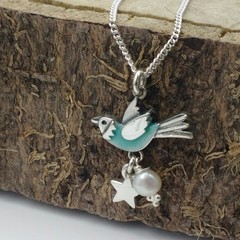 Aqua blue flying bird pendant