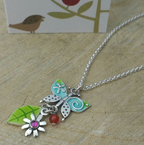 Butterfly and flower pendant